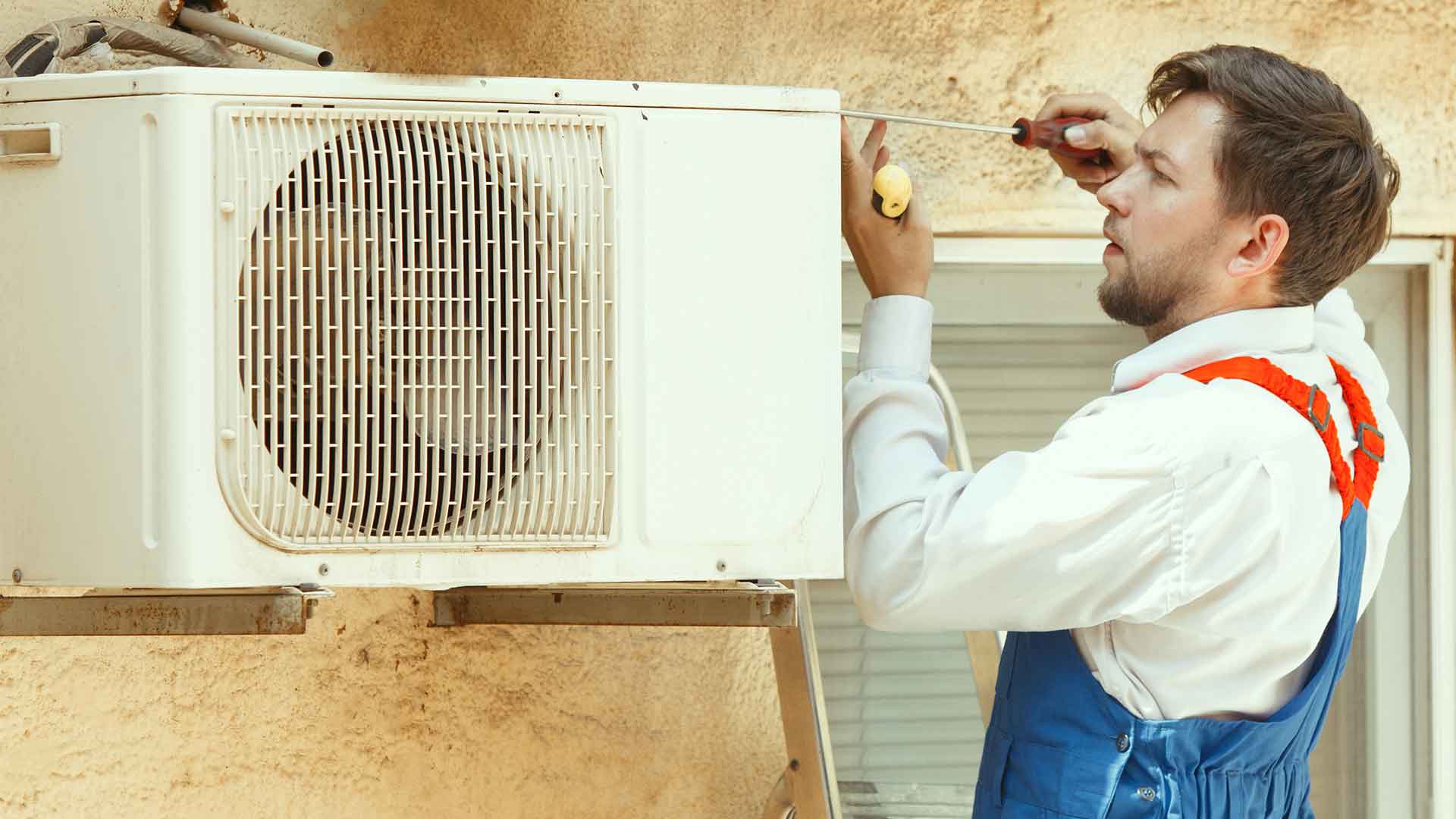 Modern HVAC system and professional technician